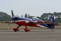 F-TGCJ @ LFRH - Extra EA-330SC, Taxiing after landing, Lann Bihoué Air Base (LFRH-LRT) Open day 2012 - by Yves-Q