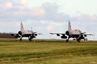 39289 @ EGQS - Holding for departure (on left) with a colleague in a 'D' model  twin seater on runway 05 at RAF Lossiemouth whilst participating in Exercise Joint Warrior 14-2 - by Clive Pattle