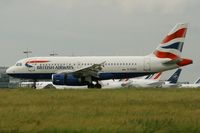 G-EUOC @ LFPG - Airbus A319-131, Reverse thrust landing Rwy 26L, Roissy Charles De Gaulle Airport (LFPG-CDG) - by Yves-Q
