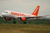 G-EZDM @ LFPG - Airbus A319-111, Landing Rwy 26L, Roissy Charles De Gaulle Airport (LFPG-CDG) - by Yves-Q