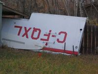 C-FQXL - The wings have been removed from QXL - by Theodore Bert Rose