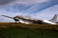 VH-INX @ MEL - Ex Ansett Airlines of Australia Douglas Dc4 VH-INX derelict at Melton in Victoria. Photo taken in mid 1970's - by Peter Lea