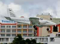 N6904A @ TNCM - On short finals at St Maarten. - by kenvidkid