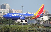 N913WN @ FLL - Southwest new 2014 colors - by Florida Metal