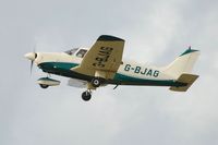 G-BJAG @ EGFH - Visiting Piper Archer II departing Runway 22. - by Roger Winser