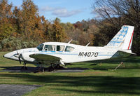 N14070 @ 3N5 - This Piper Aztec has been sitting here for quite a while.  Her tires flattened and the runway at Newton Airport blocked by utility construction vehicles, there is no way out for this old bird. - by Daniel L. Berek