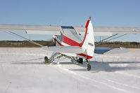 N1892A - N1892A on skis - by JW