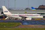 OY-KBO @ EGCC - Scandinavian Airlines retro scheme - by Chris Hall