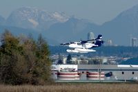 C-FGQH @ YVR - departure from the Fraser River