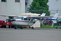 C-GZWF @ CYOW - Cessna 337H Super Skymaster [337-01862] Ottawa-Macdonald Cartier International~C 18/06/2005. Taken through glass on coach whilst moving. - by Ray Barber