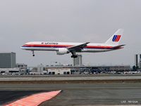 N512UA @ KLAX - landing 25L at KLAX - by Tom Vance