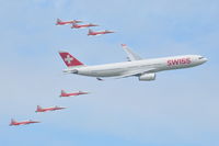 HB-JHN @ LSMP - Swiss International Air Lines A330-300 and F-5E fighters of Patrouille Suisse over Payerne Air Base, Switzerland. AIR14 - 100 years Swiss Air Force. - by Henk van Capelle