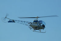VH-SON - Bell 47G-4 Soloy [3135] Brisbane area~VH 19/03/2007. Taken through glass of moving coach whilst on the motorway.
