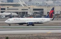 N828DN @ KLAX - Boeing 737-900ER - by Mark Pasqualino