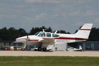 N8910U @ KOSH - Beech B55 - by Mark Pasqualino