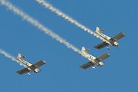 G-VFDS @ EGFH - Three-ship formation aerobatics practice by Team Raven. G-VFDS leads G-CIBM and G-EGRV (in the number 3 slot) out of a loop prior to landing. - by Roger Winser