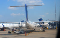 N380NG @ KIAD - At the gate IAD - by Ronald Barker