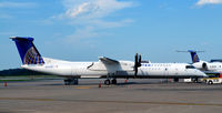 N380NG @ KIAD - At the gate IAD - by Ronald Barker