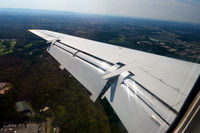 N844HK @ KIAD - Flaps down landing at Dulles - by Ronald Barker