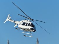 C-FPBQ @ CBC7 - TRK Helicopters Bell 407 about to land at Vancouver Harbour Heliport. - by M.L. Jacobs