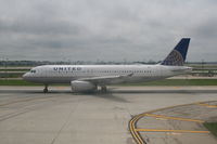N442UA @ KORD - Taxiing on runway
