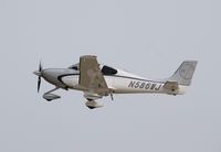 N586WJ @ KOSH - Cirrus SR22T - by Mark Pasqualino