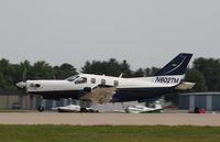 N602TM @ KOSH - Socata TBM-700 - by Mark Pasqualino