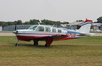 N17US @ KOSH - Beech A36 - by Mark Pasqualino