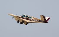 N757GM @ KOSH - Beech C35