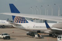 N13718 @ KORD - Parked at gate