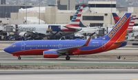 N267WN @ KLAX - Being 737-700 - by Mark Pasqualino