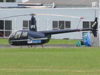ZK-IPZ @ NZAR - long shot across runway from cafe - by magnaman
