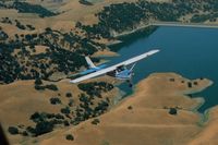 N4058J - 58J over San Antonio reservoir, near Sunol,Ca. moving in for some pictures.