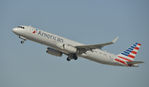 N117AN @ KLAX - Departing LAX on 25R - by Todd Royer