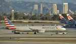 N102NN @ KLAX - Getting towed to gate at LAX - by Todd Royer