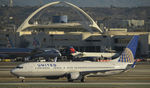 N73406 @ KLAX - Taxiing to gate after landing on 25L at LAX - by Todd Royer
