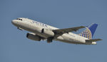 N837UA @ KLAX - Departing LAX on 25R - by Todd Royer