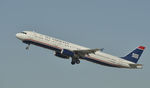 N561UW @ KLAX - Departing LAX on 25R - by Todd Royer