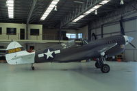 VH-KTI @ YTYA - Curtiss P-40N Warhawk parked in a hangar at Tyabb airport, Victoria, Australia. - by Henk van Capelle