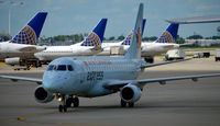 C-FEJY @ KORD - Taxi to park O'Hare - by Ronald Barker