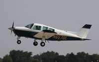 N6570L @ KOSH - Beech C23