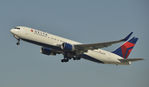 N195DN @ KLAX - Departing LAX on 25R - by Todd Royer