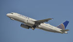 N426UA @ KLAX - Departing LAX on 25R - by Todd Royer