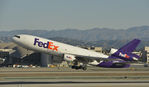 N359FE @ KLAX - Departing LAX on 25L - by Todd Royer