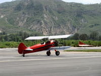N65124 @ SZP - 1943 Boeing Stearman A75N1 (PT-17) 'Spirit of OPEC', P&W R-985 Wasp Jr. (by Jacobs) 450 Hp upgrade, landing roll Rwy 22 - by Doug Robertson