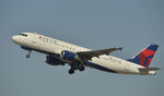 N352NW @ KLAX - Departing LAX on 25R - by Todd Royer