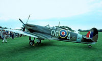 G-AIST @ EGTH - Supermarine Spitfire Mk.Ia [WASP/20/2] Old Warden~G 11/07/1982. From a slide. - by Ray Barber