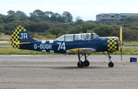 G-OUGH @ EGFH - Resident Yak-52. Marked 62/IV on port side fuselage/fin. - by Roger Winser