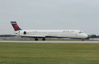 N923DN @ KSRQ - MD-90-30 - by Mark Pasqualino