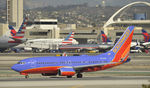 N242WN @ KLAX - Landing at LAX on 25L - by Todd Royer